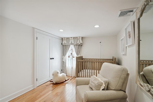 bedroom featuring recessed lighting, visible vents, baseboards, and light wood-style floors