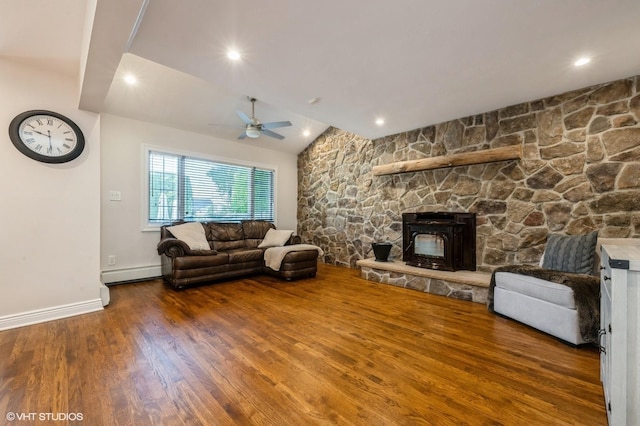 living room featuring lofted ceiling, wood finished floors, baseboards, a baseboard heating unit, and a ceiling fan