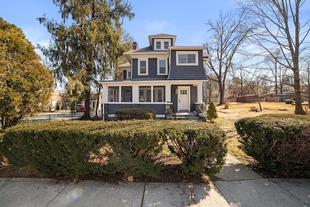 view of front of property featuring a chimney