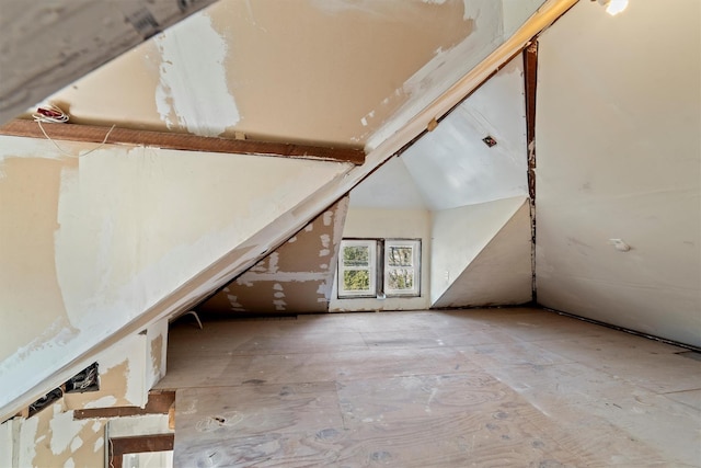 bonus room with vaulted ceiling