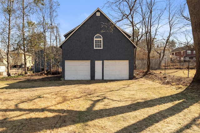 garage with fence