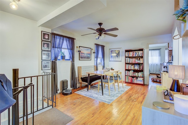 office space featuring light wood-style floors, a wealth of natural light, and ceiling fan