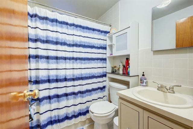 bathroom featuring vanity, decorative backsplash, curtained shower, tile walls, and toilet