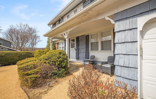 property entrance with covered porch