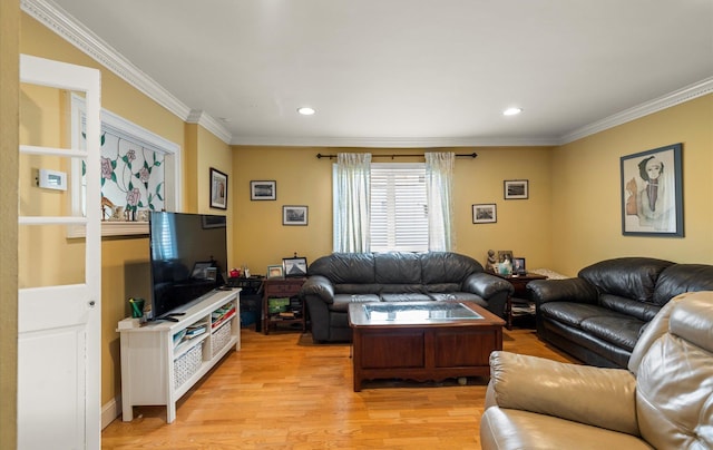 living room with recessed lighting, light wood-style floors, and ornamental molding