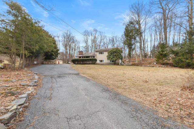 view of road with driveway