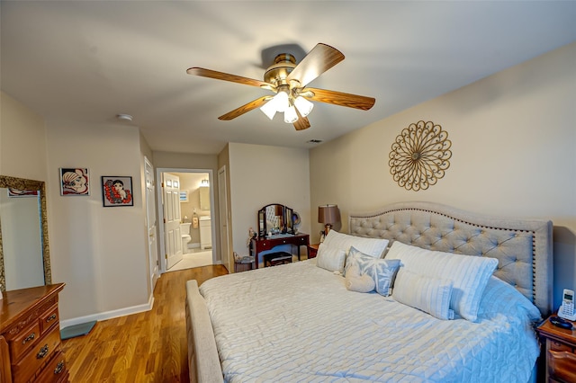 bedroom featuring ceiling fan, baseboards, light wood finished floors, and connected bathroom