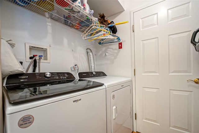 clothes washing area featuring laundry area and independent washer and dryer