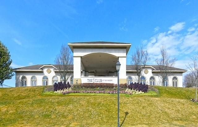 exterior space with a lawn