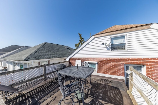 deck featuring outdoor dining area