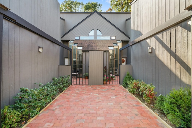 view of patio / terrace featuring fence and a gate