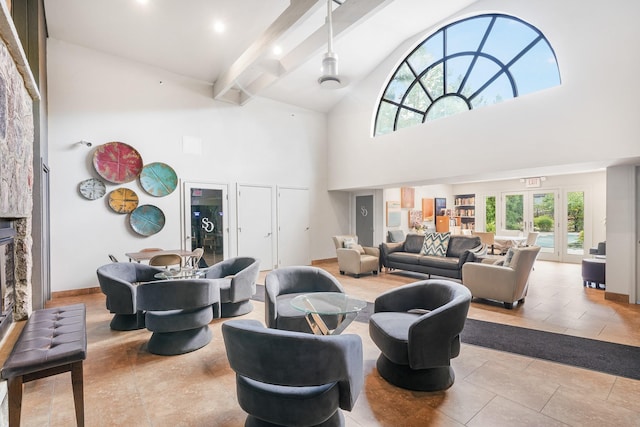 living room with beam ceiling, high vaulted ceiling, french doors, a fireplace, and tile patterned flooring