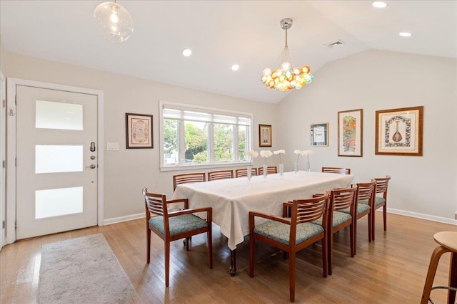 dining room with visible vents, recessed lighting, baseboards, light wood finished floors, and lofted ceiling