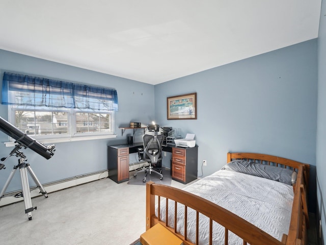 bedroom featuring baseboard heating and light carpet