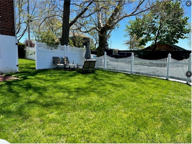 view of yard featuring fence