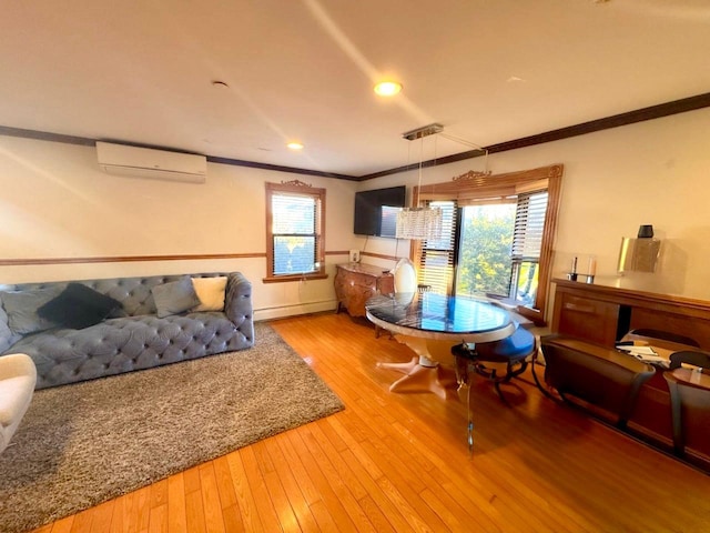 125-19 14th Ave, College Point, NY 11356 - living area with a wall mounted air conditioner, ornamental molding, light wood finished floors, and recessed lighting