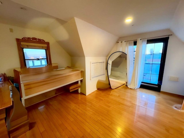 125-19 14th Ave, College Point, NY 11356 - additional living space with hardwood / wood-style floors and vaulted ceiling