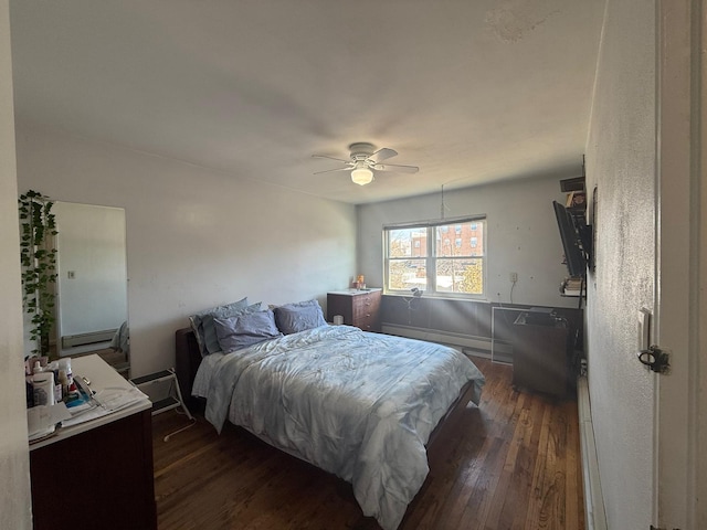 bedroom featuring dark wood-style floors and a ceiling fan