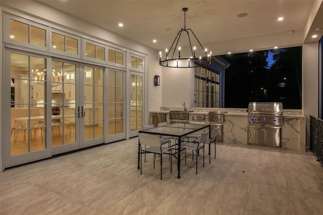 dining space with recessed lighting and french doors