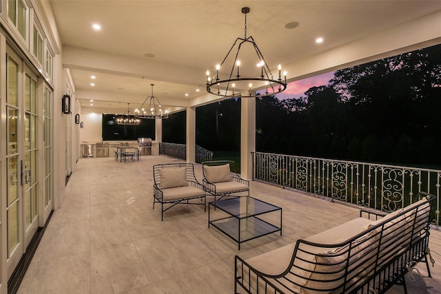 view of patio terrace at dusk