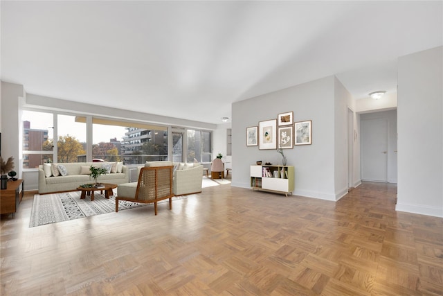 living room featuring baseboards