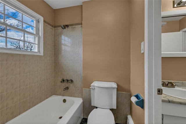 full bathroom featuring vanity, baseboard heating, toilet, and shower / bathtub combination