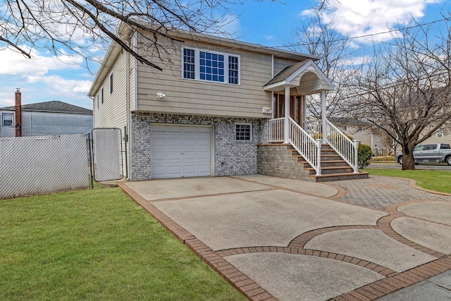 view of front of house featuring brick siding, fence, concrete driveway, a front yard, and a garage