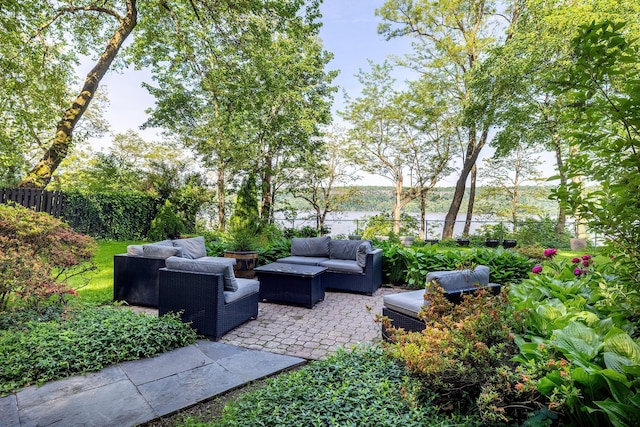 2727 Palisade Ave Unit 9B, Bronx, NY 10463 - fenced backyard featuring an outdoor hangout area, a patio, and a water view