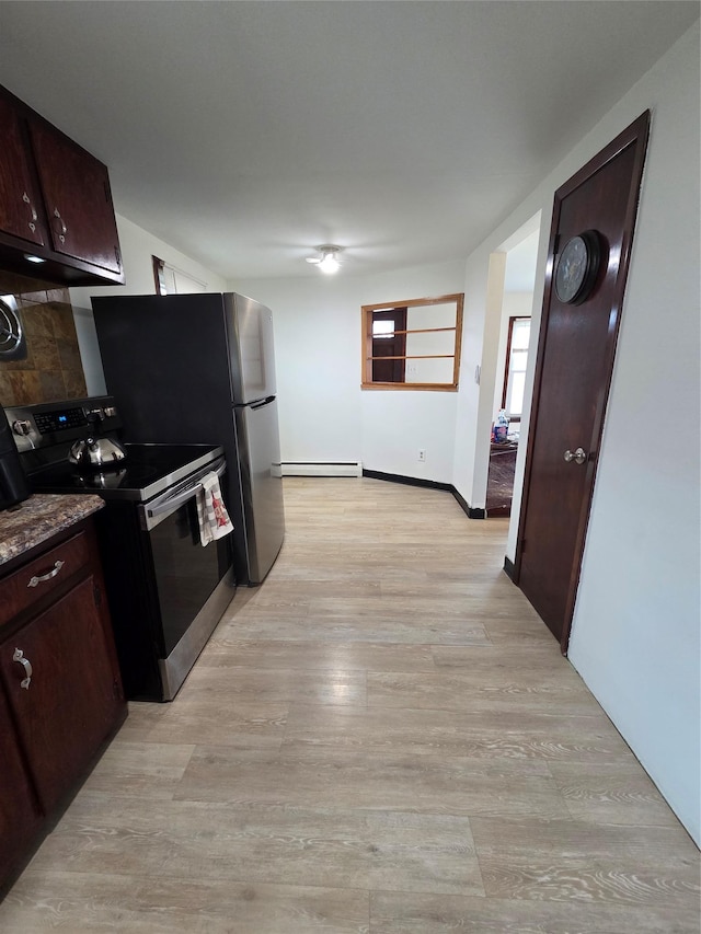 kitchen featuring dark brown cabinetry, range with electric cooktop, tasteful backsplash, and light wood-style floors