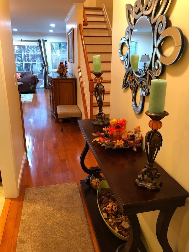 dining space with stairway, recessed lighting, and hardwood / wood-style flooring