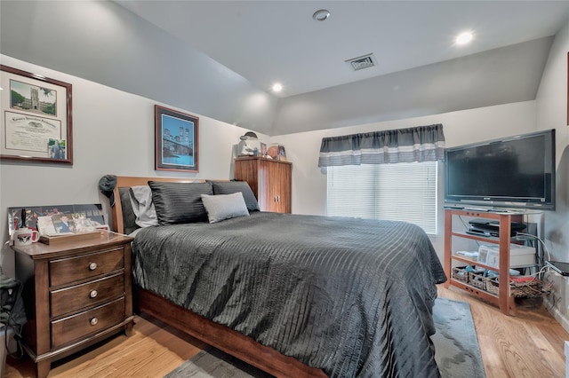 bedroom with recessed lighting, visible vents, and light wood-style flooring