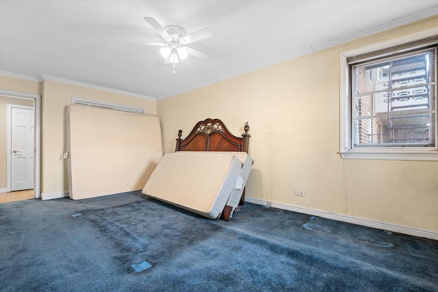 unfurnished bedroom featuring ceiling fan, carpet, baseboards, and ornamental molding