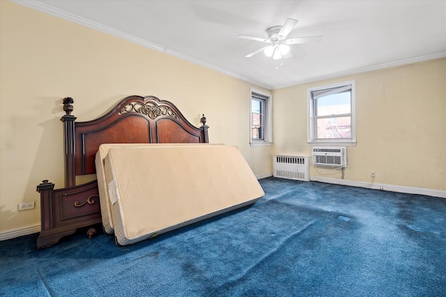 bedroom featuring radiator heating unit, baseboards, dark colored carpet, and ornamental molding