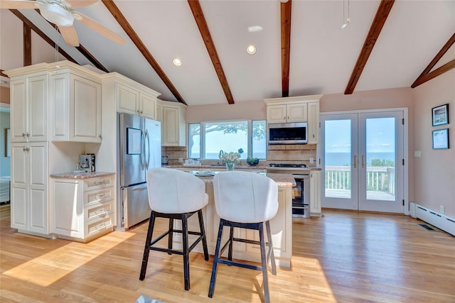 48 Crows Nest Dr, Baiting Hollow, NY 11901 - kitchen featuring stainless steel appliances, tasteful backsplash, light wood-style floors, and recessed lighting