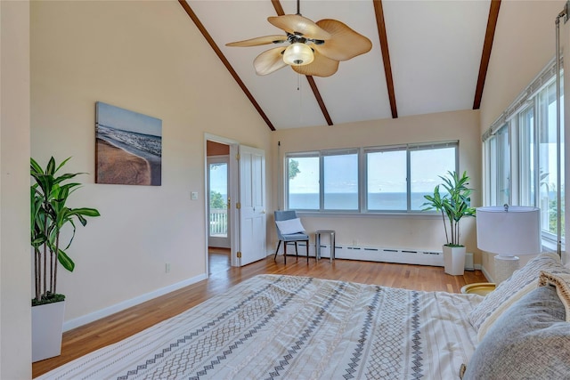 48 Crows Nest Dr, Baiting Hollow, NY 11901 - sitting room featuring plenty of natural light, a baseboard radiator, beam ceiling, high vaulted ceiling, and a ceiling fan