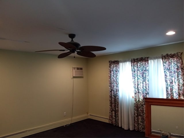 empty room with recessed lighting, a ceiling fan, and a baseboard radiator