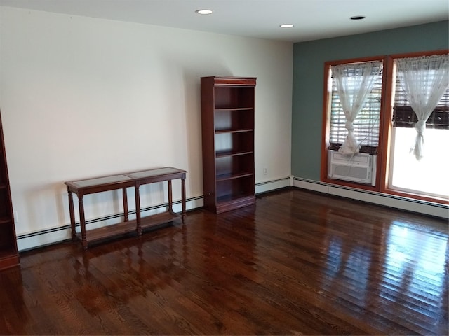 2706 Peconic Ave, Seaford, NY 11783 - unfurnished room with recessed lighting, a baseboard heating unit, and wood finished floors