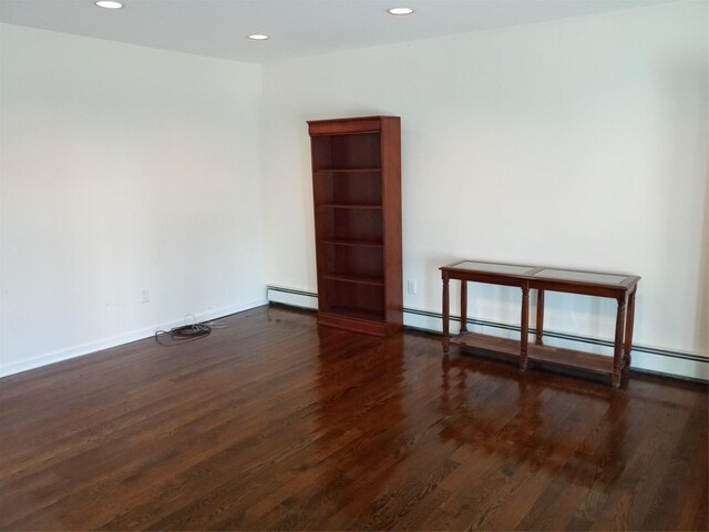 2706 Peconic Ave, Seaford, NY 11783 - empty room with recessed lighting, baseboard heating, baseboards, and wood finished floors