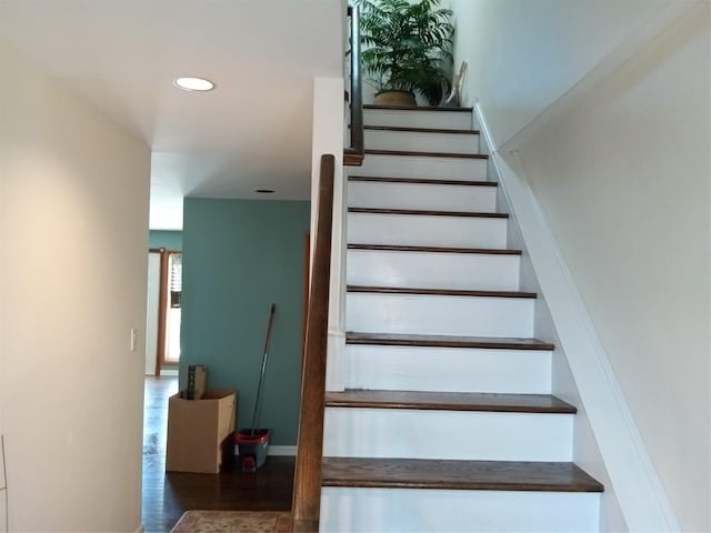 2706 Peconic Ave, Seaford, NY 11783 - stairs featuring wood finished floors, baseboards, and recessed lighting