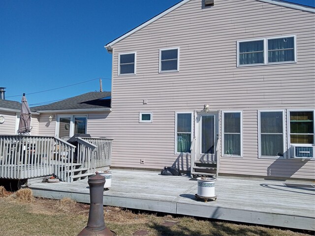 2706 Peconic Ave, Seaford, NY 11783 - rear view of house featuring a wooden deck