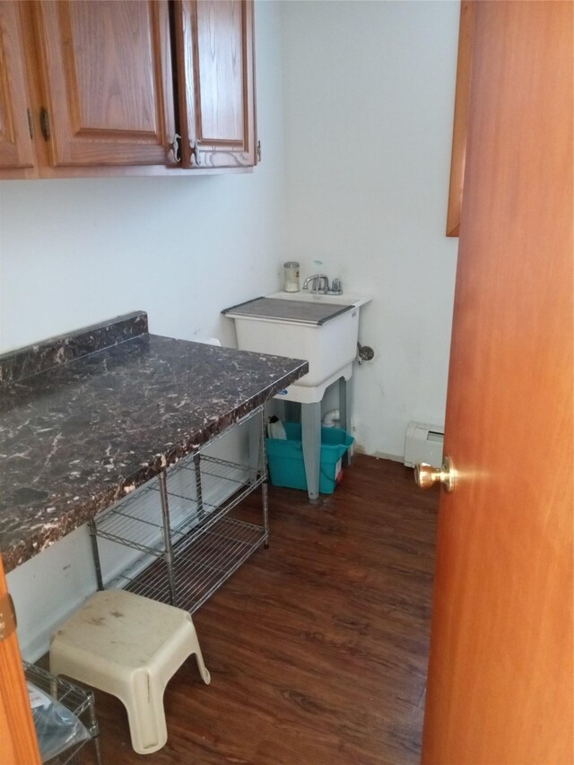 2706 Peconic Ave, Seaford, NY 11783 - interior space with dark wood-type flooring and a baseboard radiator