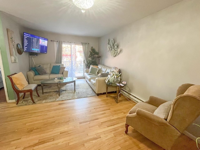 5822 Van Cleef St, Corona, NY 11368 - living area with a baseboard radiator and wood finished floors