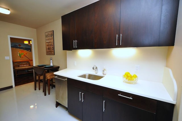 kitchen featuring a sink, modern cabinets, dishwasher, and light countertops