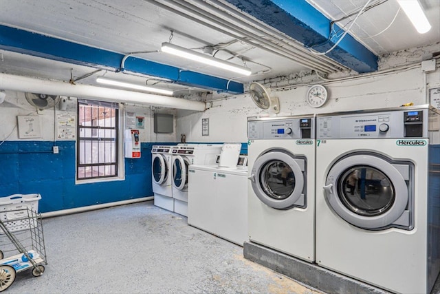 common laundry area featuring separate washer and dryer