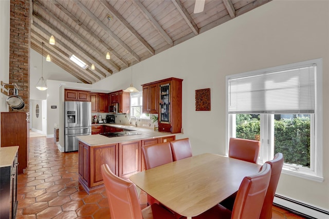 dining room with light tile patterned floors, baseboard heating, beamed ceiling, and wood ceiling