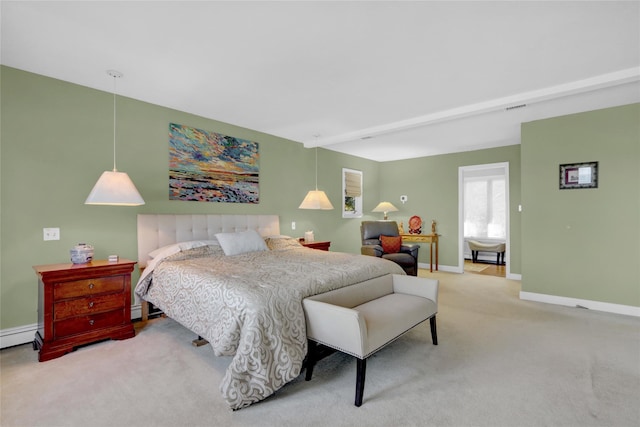 bedroom featuring visible vents, baseboards, carpet flooring, and a baseboard radiator
