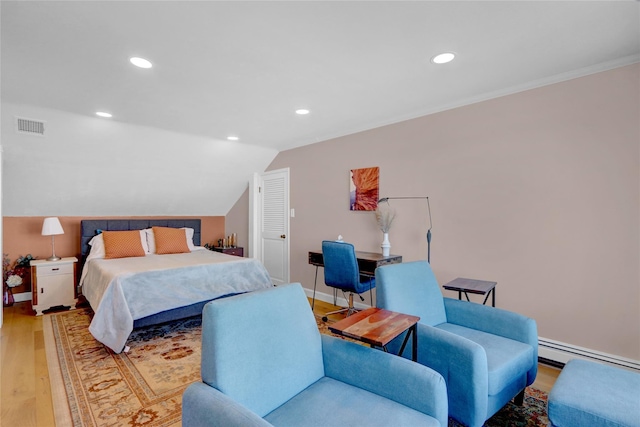 bedroom with visible vents, baseboards, lofted ceiling, recessed lighting, and light wood-style floors