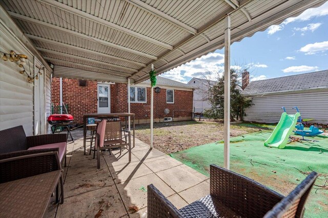 view of patio with outdoor dining area