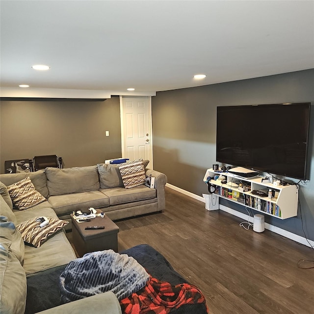 living area featuring recessed lighting, wood finished floors, and baseboards