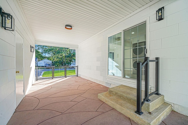 view of patio / terrace with a porch and entry steps